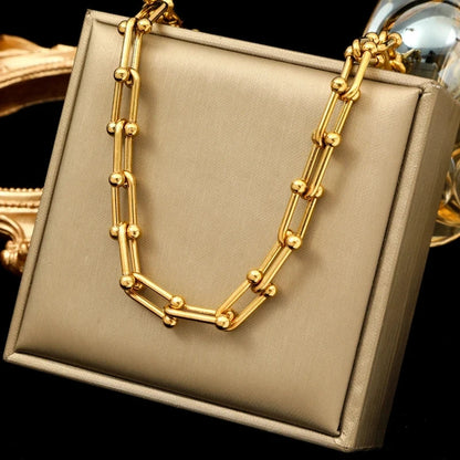 Orsini Astoria gold chain necklace with polished spherical link accents for a luminous luxe finish