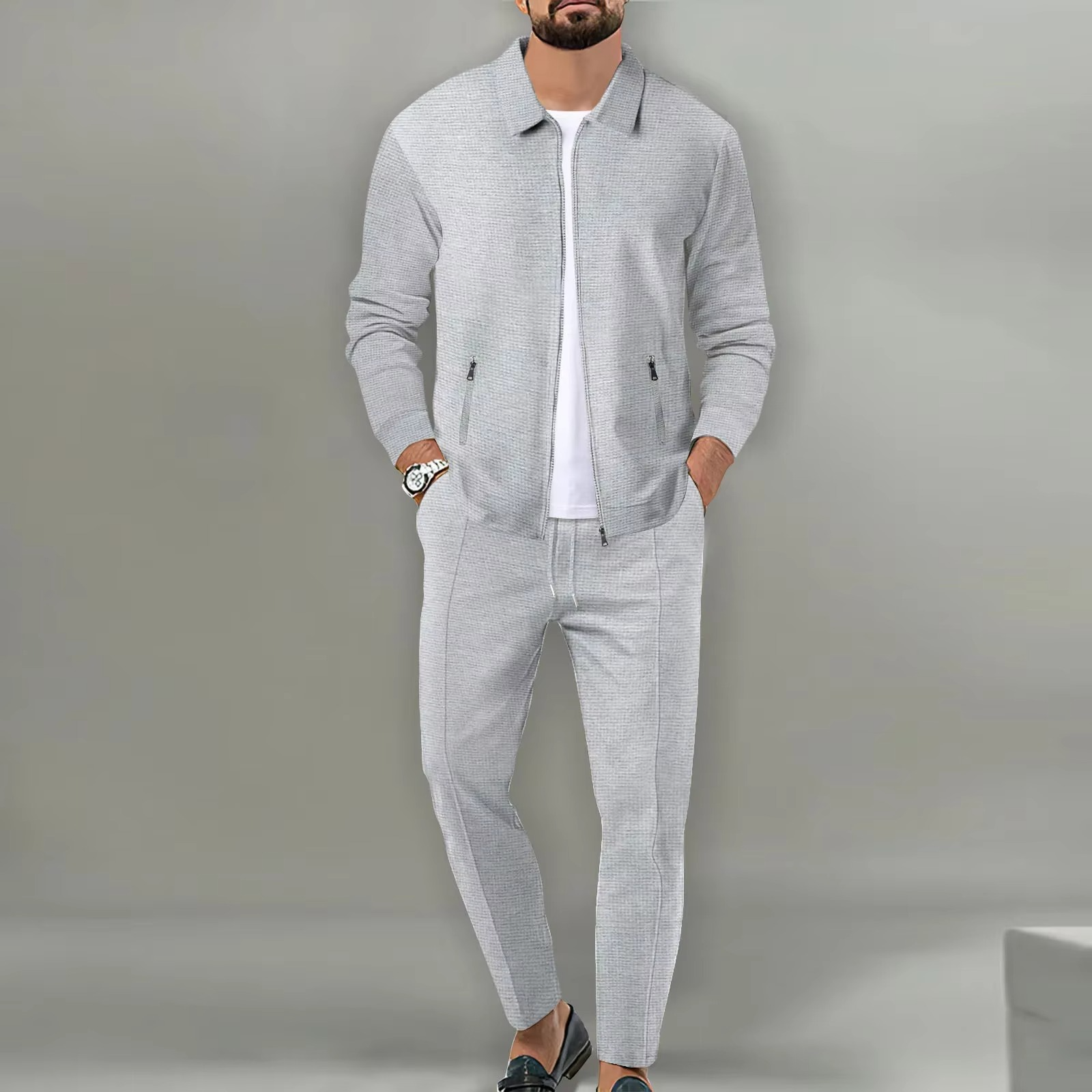 Men's two-piece polo jacket shirt and matching drawstring pants set in coordinated everyday comfort style