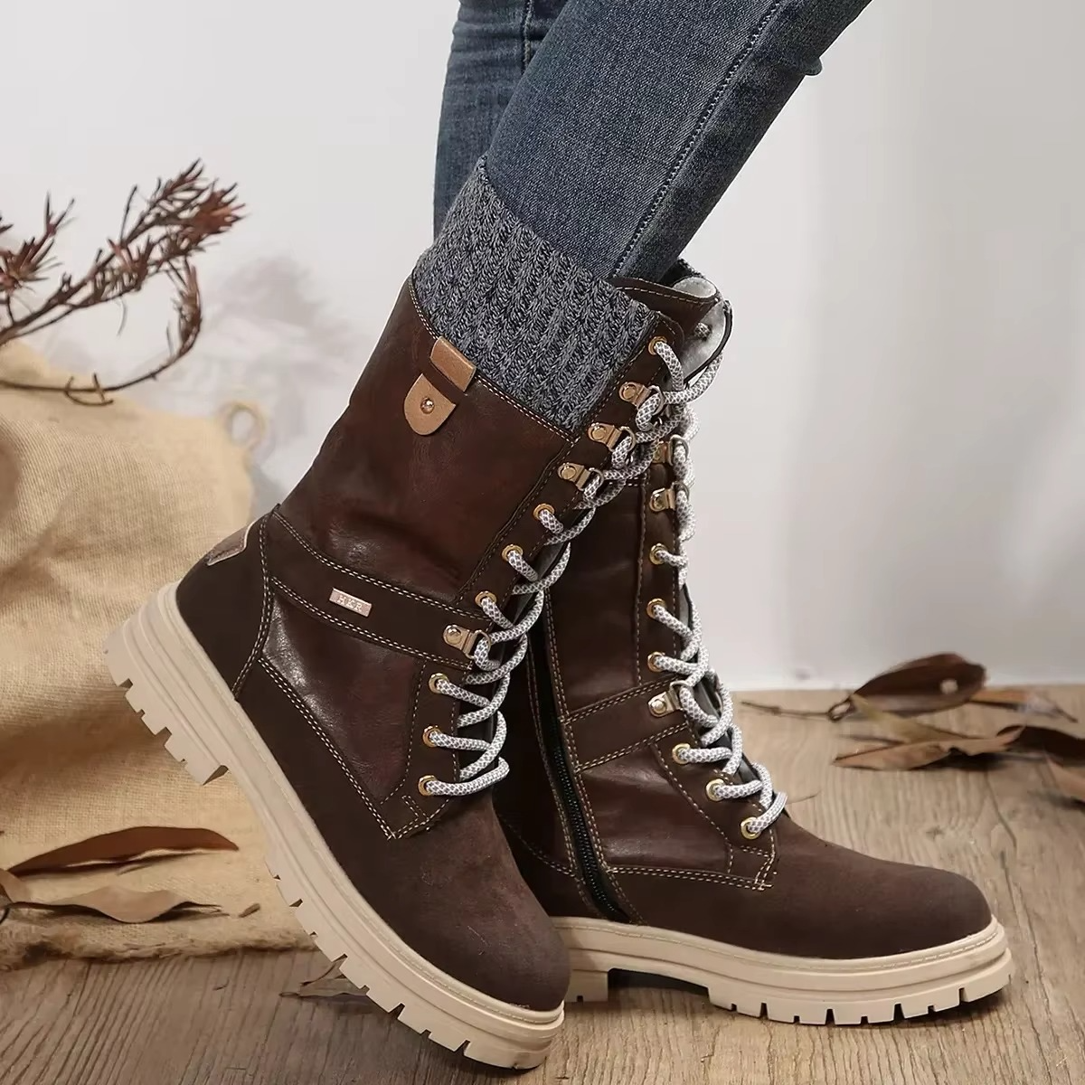 Women's brown retro lace-up mid-calf winter boots with rib-knit cuff and plush lining