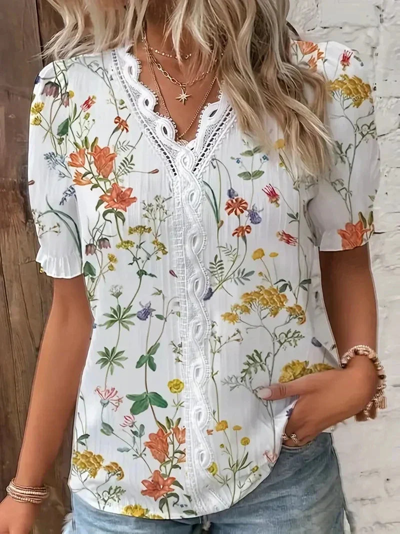 Floral lace V-neck blouse relaxed fit with delicate feminine detailing in soft elegant style