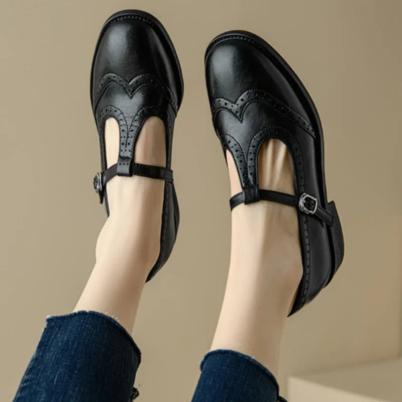 Women's black T-strap Mary Jane shoes low block heel brogue detailing adjustable buckle closure