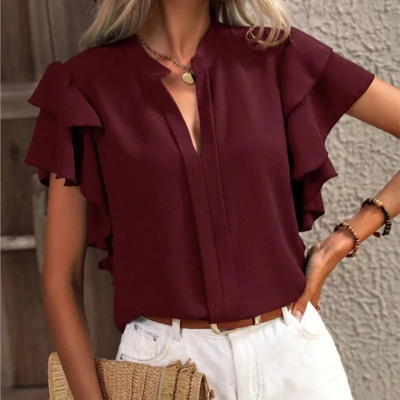 Chic women's blouse with elegant ruffle sleeves in a light flowing fabric for a feminine fit