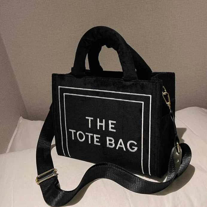 Soft velour square tote bag with original letter print, spacious interior, and optional strap