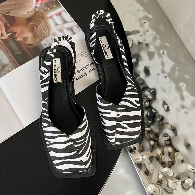 Women's comfort slip-on shoes in neutral tones with cushioned insole and ergonomic supportive sole