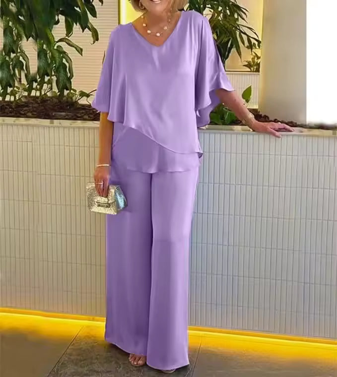 Elegant two-piece matching set with flowing top and pants, polished chic style with airy comfort fit