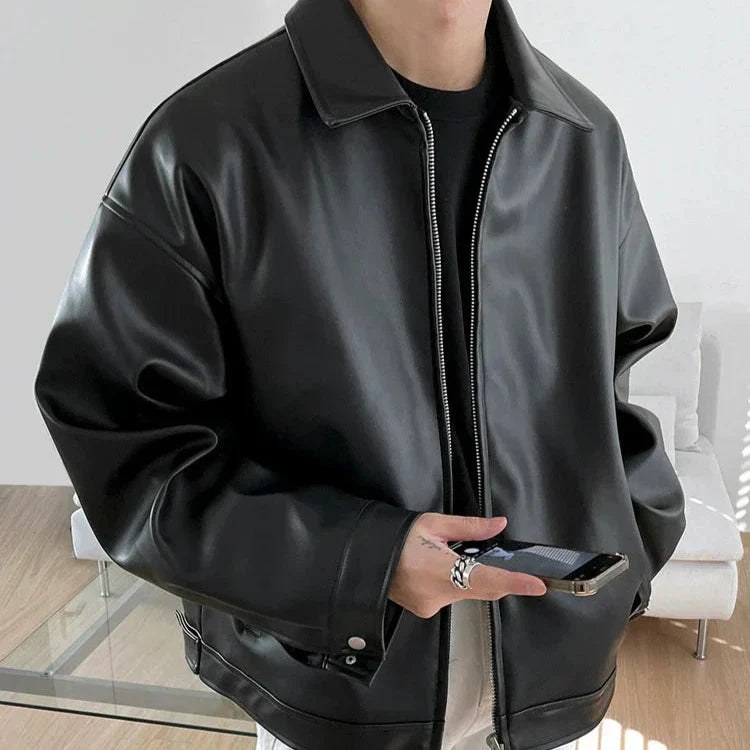 Men's black oversized leather bomber jacket boxy silhouette bold minimalist streetwear style