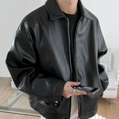 Men's black oversized leather bomber jacket boxy silhouette bold minimalist streetwear style