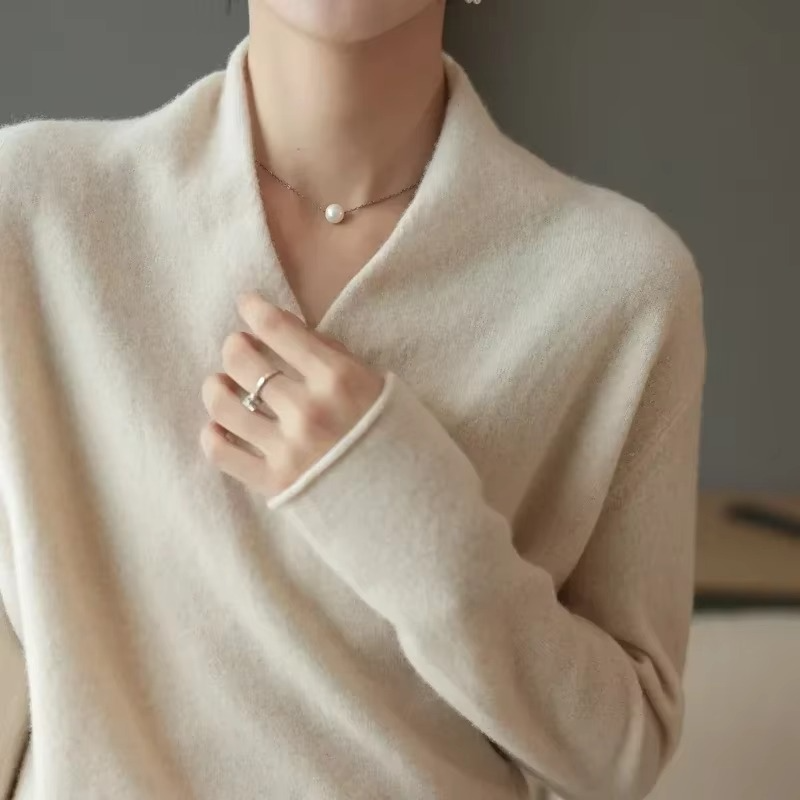 Women's wool knit V-neck pullover sweater in classic fit with cashmere-soft timeless silhouette