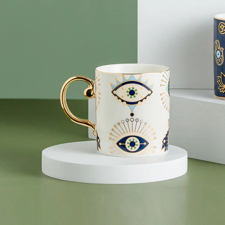 Evil Eye ceramic mug white with gold handle, Turkish-crafted protective talisman design