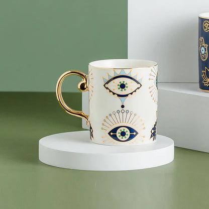 Evil Eye ceramic mug white with gold handle, Turkish-crafted protective talisman design