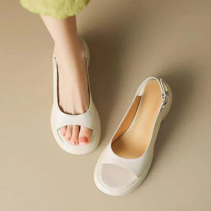 Women's open-toe platform sandals with low block heel, neutral tone, elegant minimalist silhouette
