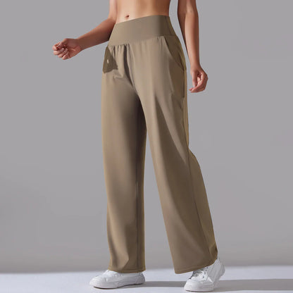 Black wide-leg leggings with silky drape, sculpting waistband, and effortless relaxed silhouette