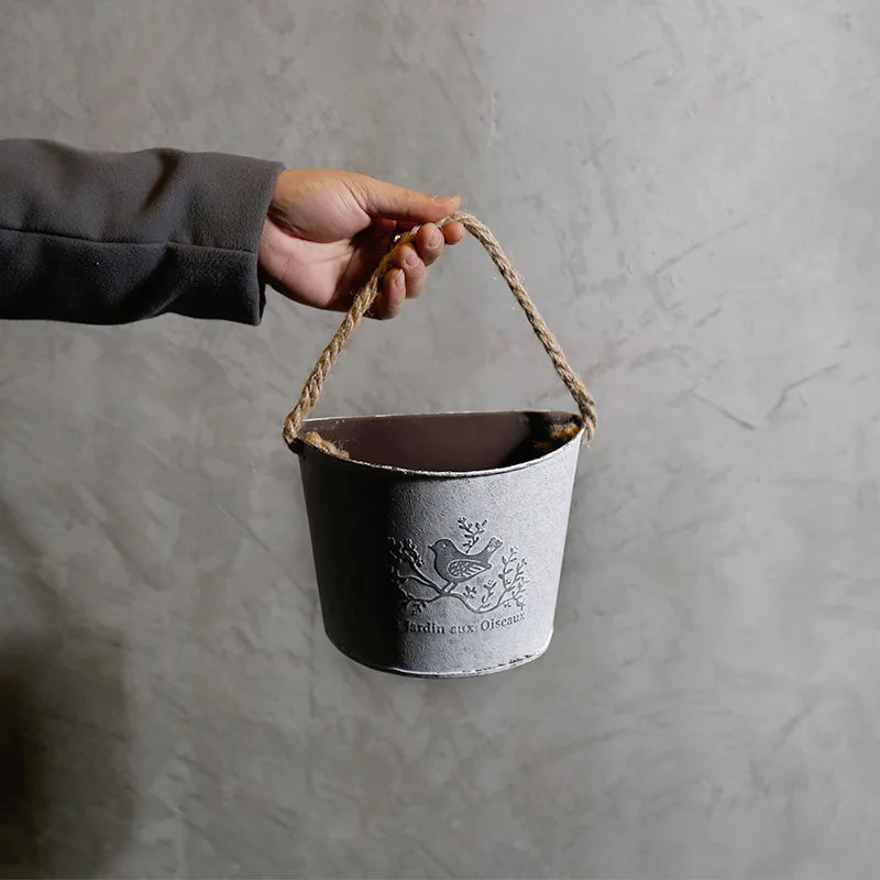 Vintage metal wall-mounted flower pot with rustic French charm, 5.5x5.5 inches garden decor