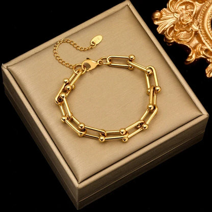 Orsini Astoria Link gold chain necklace with polished spherical accents and premium gold plating