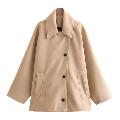 Women's oversized winter coat in cozy neutral tone, relaxed silhouette with premium insulation for layering