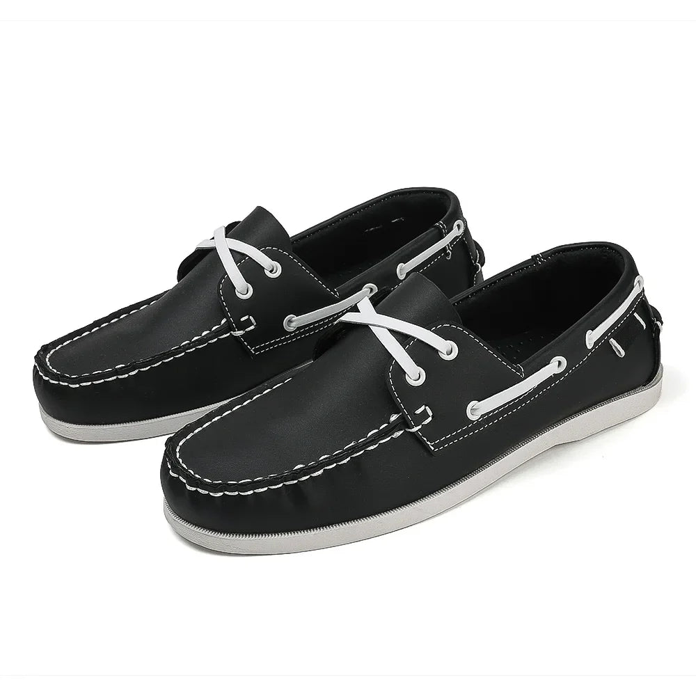 Men's navy two-tone slip-on boat shoes with leather upper and cushioned EVA foam sole
