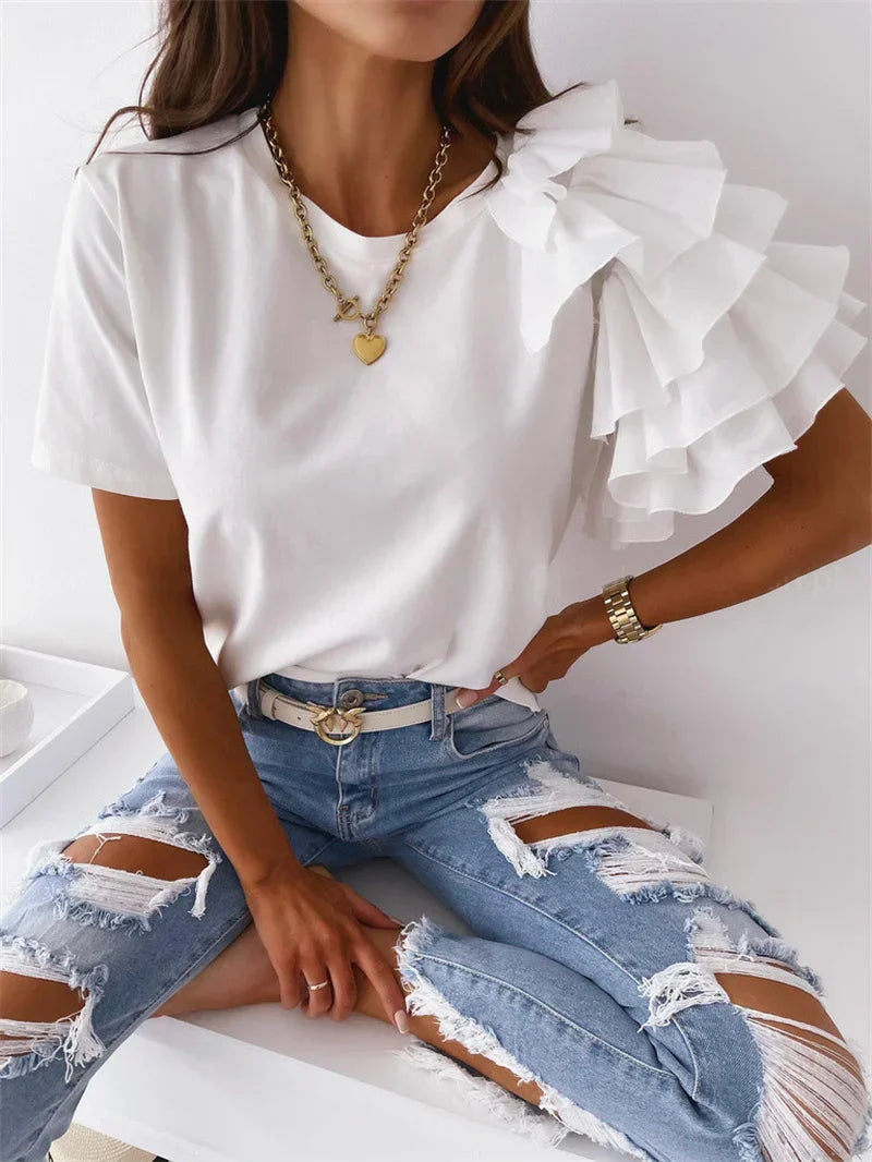 White chic ruffle sleeve top with relaxed fit and bold statement design for women