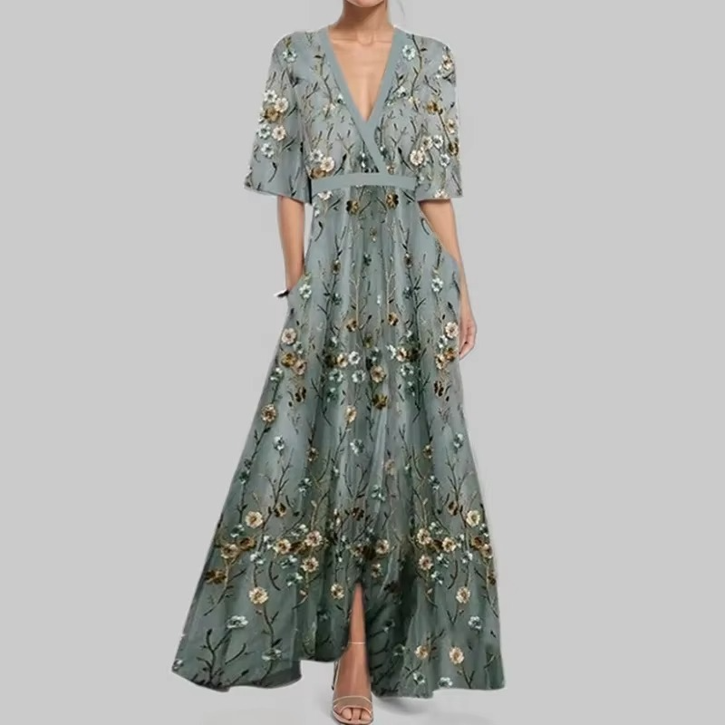 Women's ankle-length V-neck pleated maxi dress with elegant printed fabric and flowing silhouette