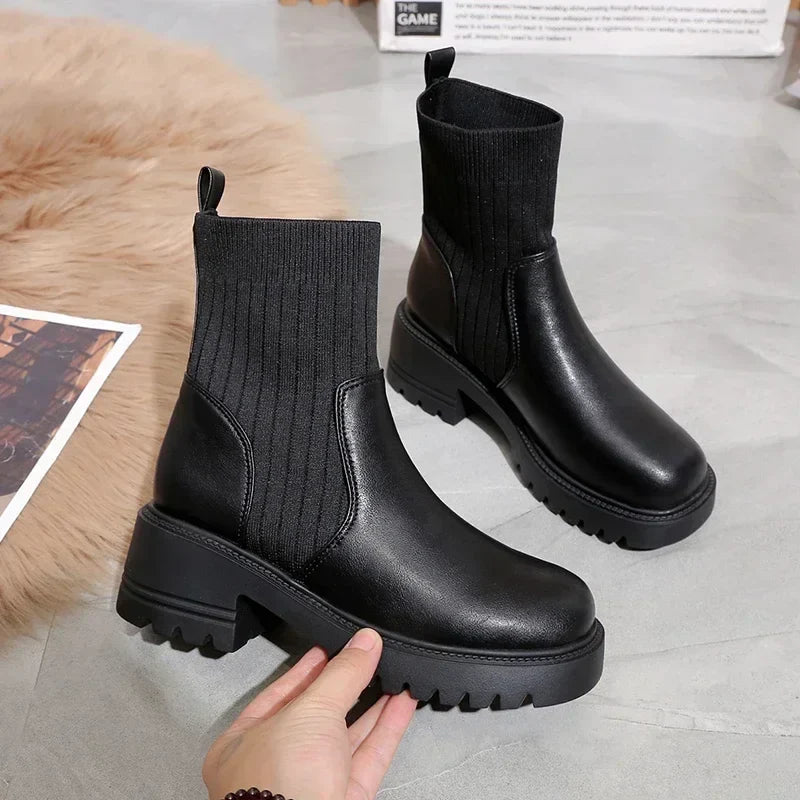 Black split knit and faux leather platform boot with rubberized grunge heel