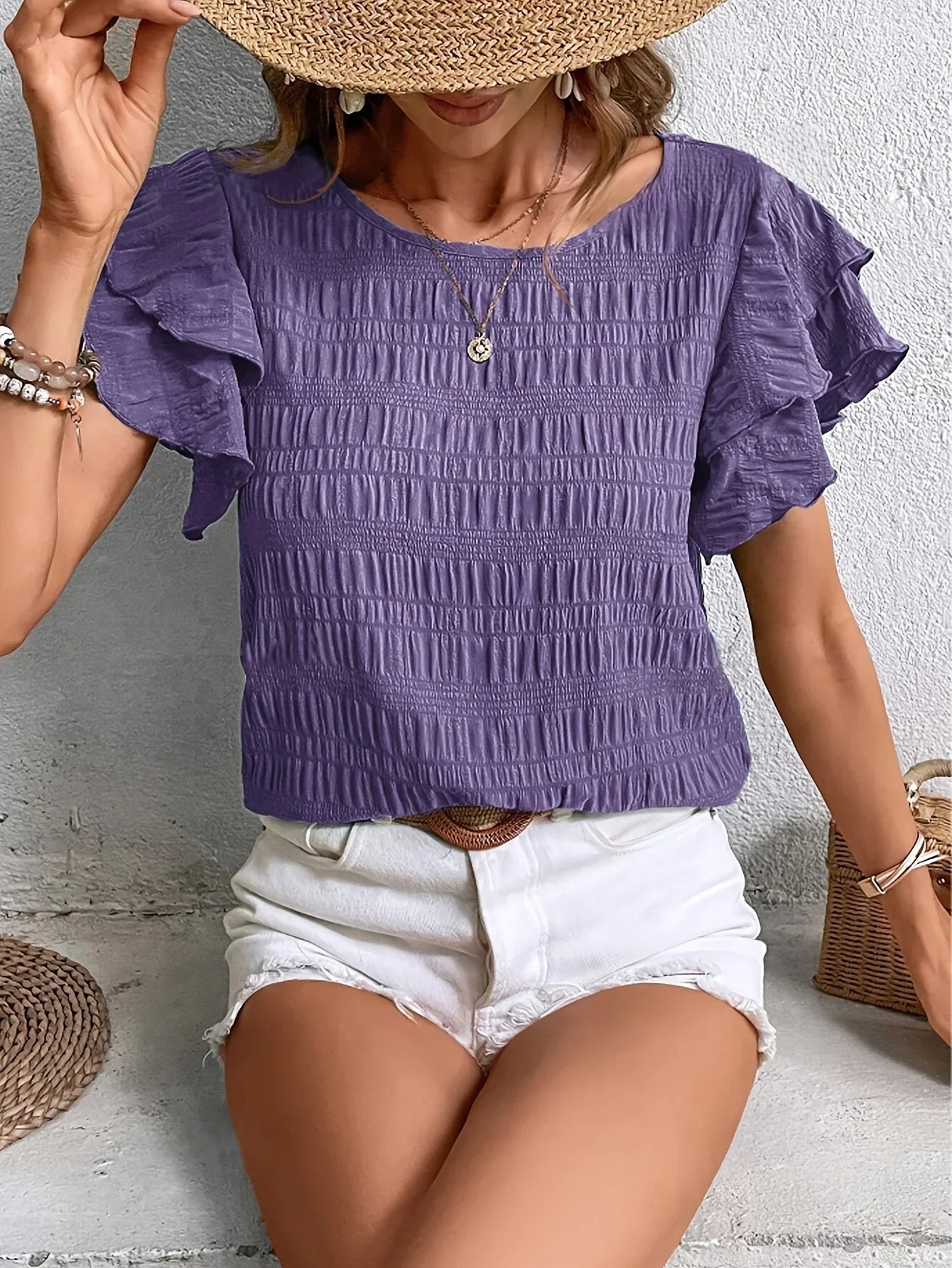 White ruffle sleeve blouse with pleated fit, lightweight feminine design for effortless summer style