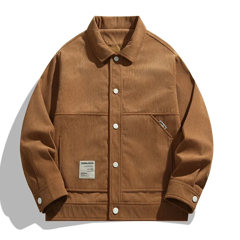 Retro 90s brown corduroy trucker jacket with turn-down collar and classic structured silhouette