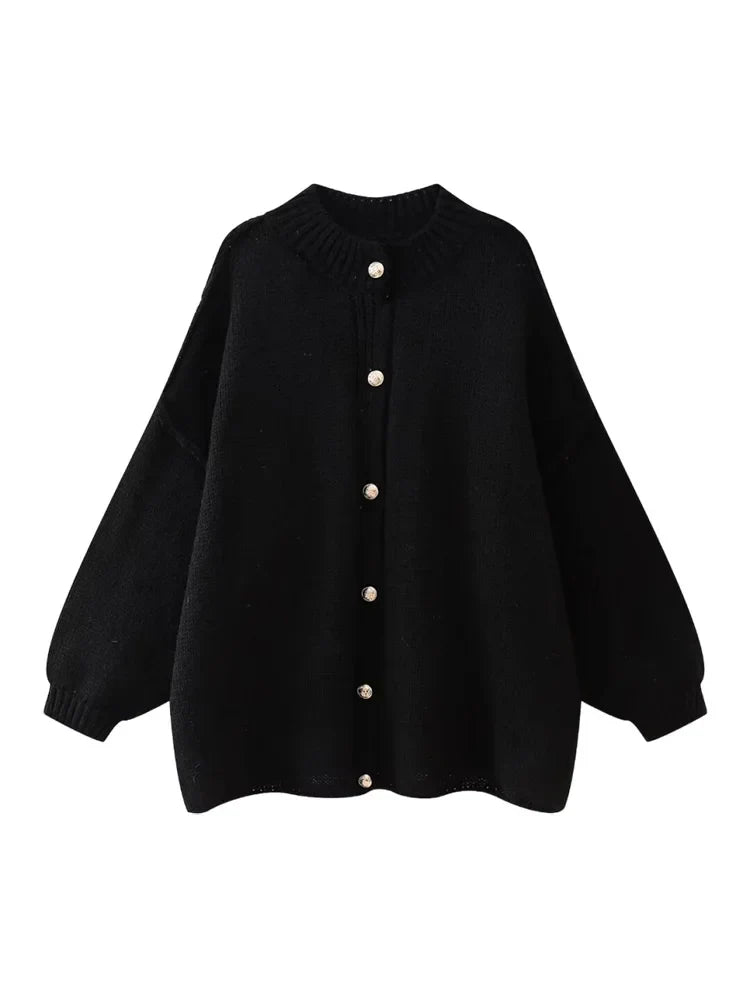 Women's oversized button-down cardigan relaxed silhouette versatile layering piece year-round style