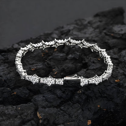 Silver cable chain bracelet with diamond-shaped rhinestone flower petals and geometric copper links