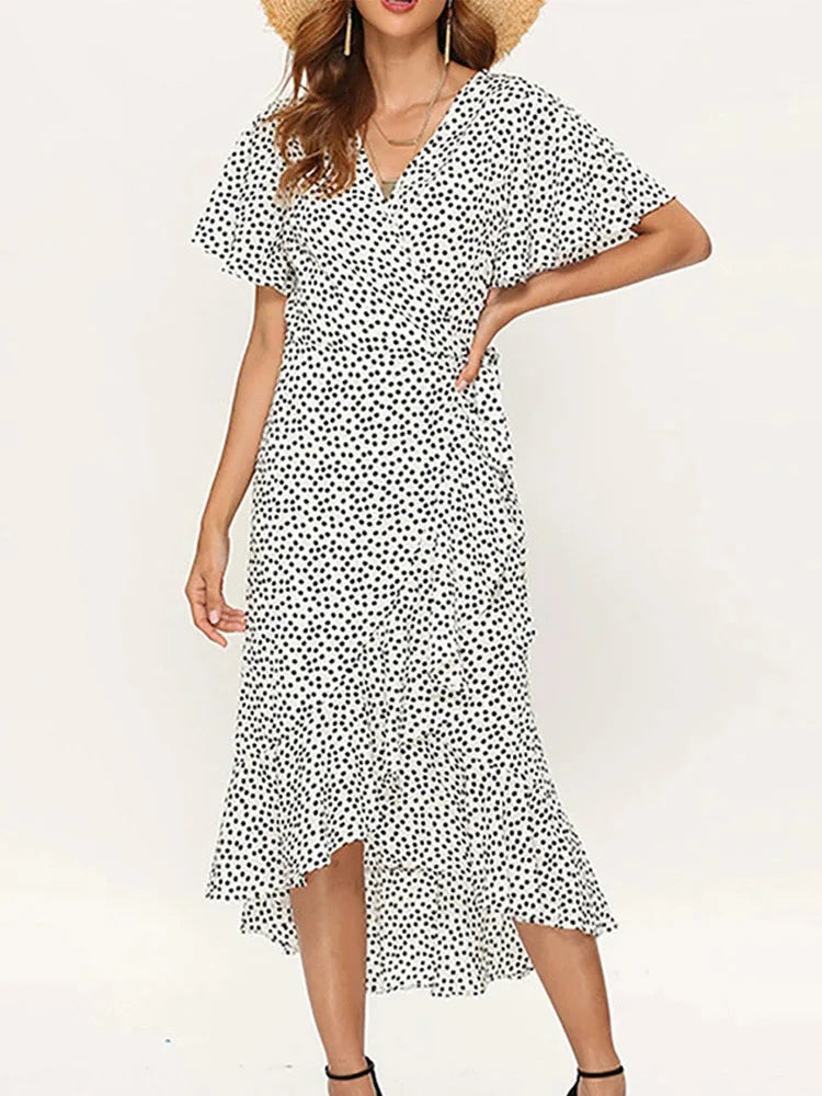 Women's floral maxi dress with V-neckline, ruffle accents, and elegant side slit for summer