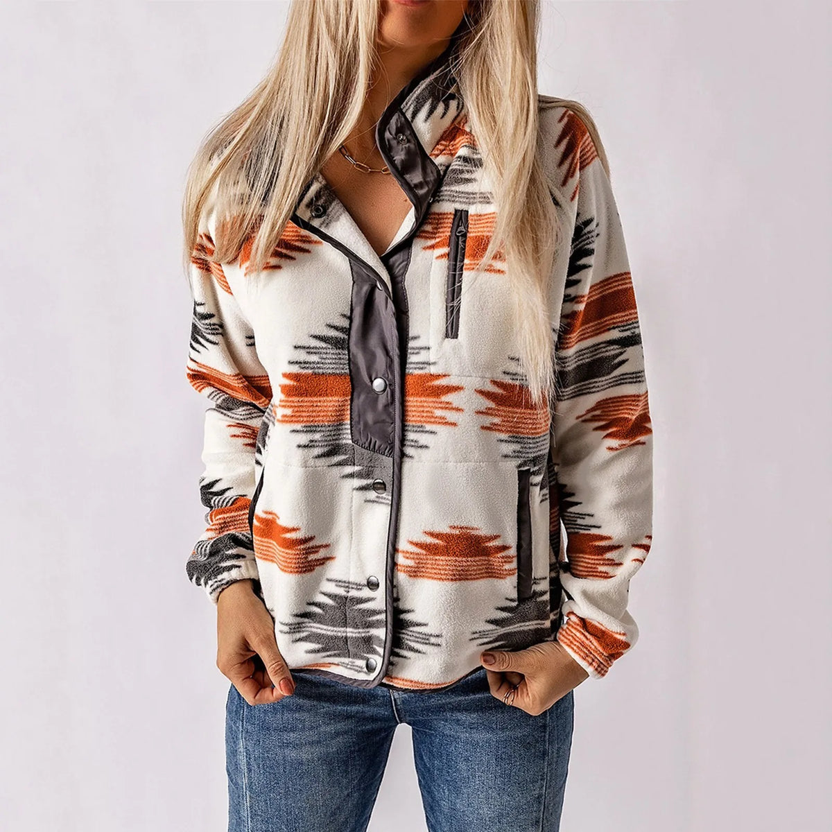 Coral fleece color-block sweater with ethnic-inspired print, button-up closure, warm cozy fit