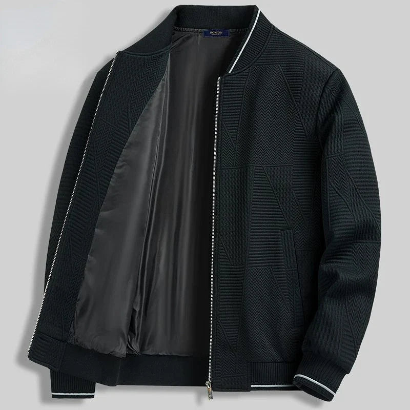 Azure blue knit jacket with geometric pattern, sporty loose fit, ribbed cuffs and stud collar