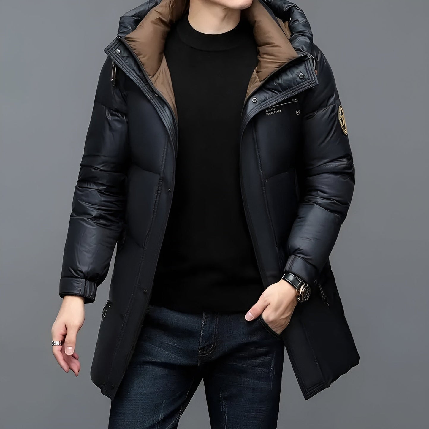 Black waterproof parka with 90% duck down insulation, sleek blacked-out finish, full coverage design