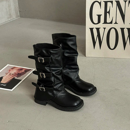 Vintage knee-high Western boots in classic tan with belt buckle accents and low heel for everyday wear