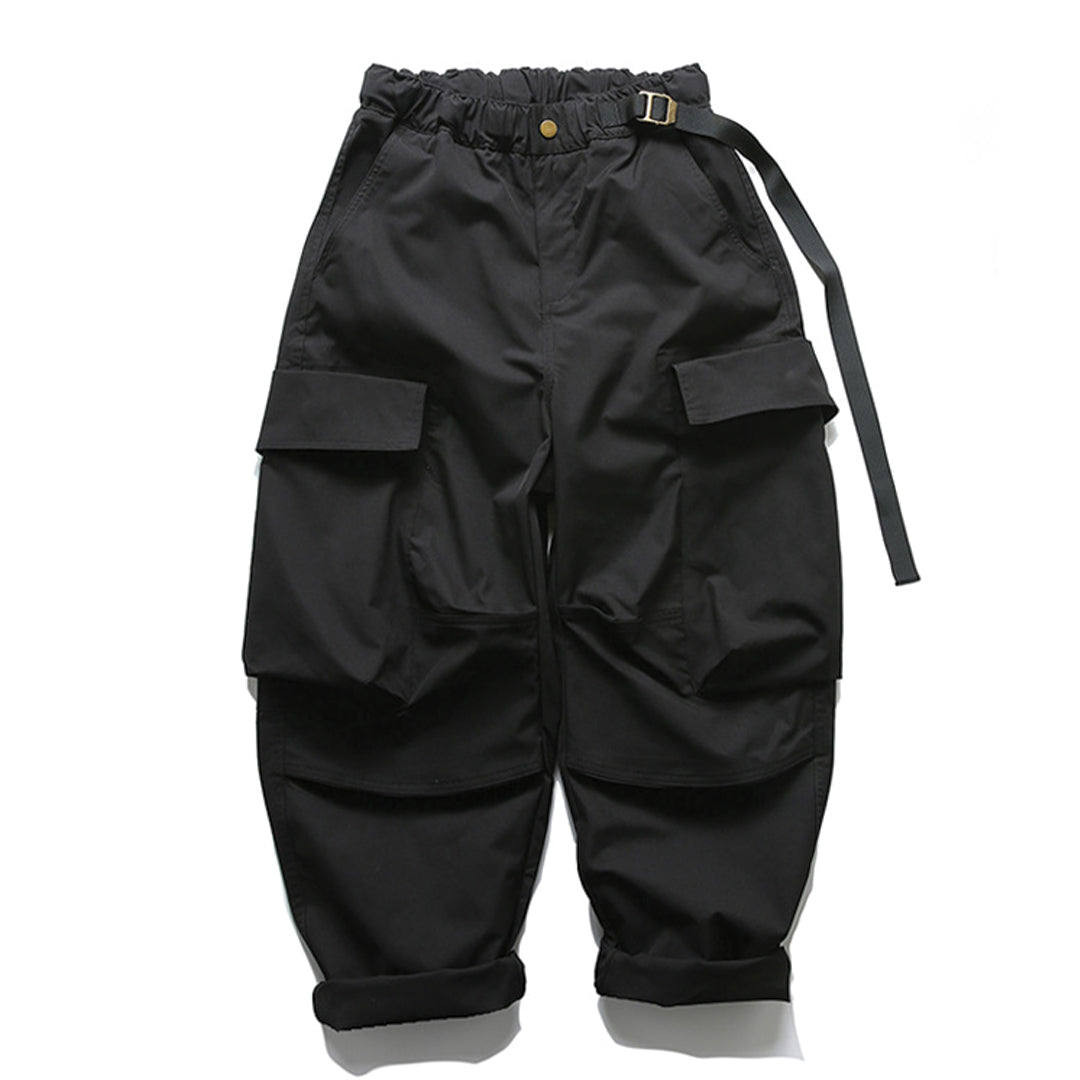 Olive cargo trousers with drawcord waist, oversized patch pockets, and custom-fit belt