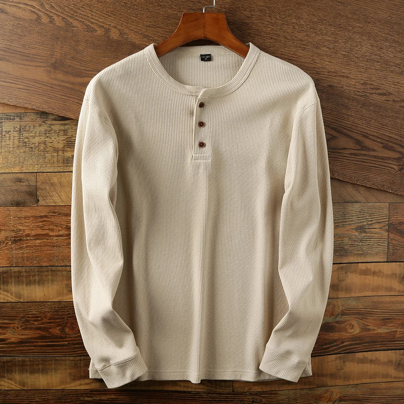 Cream waffle knit Henley long sleeve shirt with minimalist design and premium cotton blend fabric