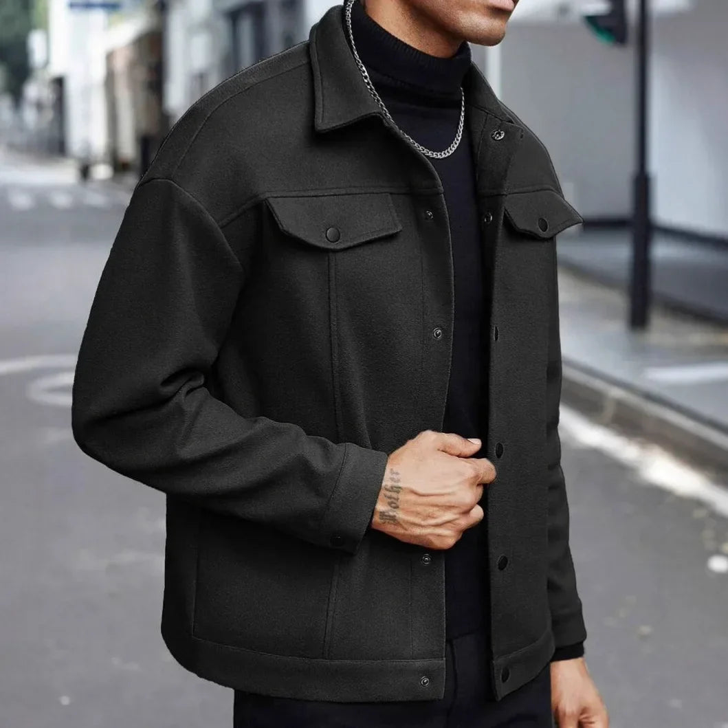 Men's charcoal wool blend tailored jacket with stand collar and chest pockets for classic warmth