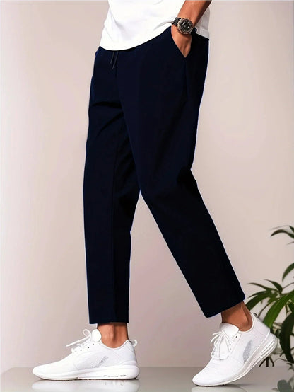 FormaFit lightweight casual pants in relaxed fit, breathable fabric for effortless spring smart-casual style