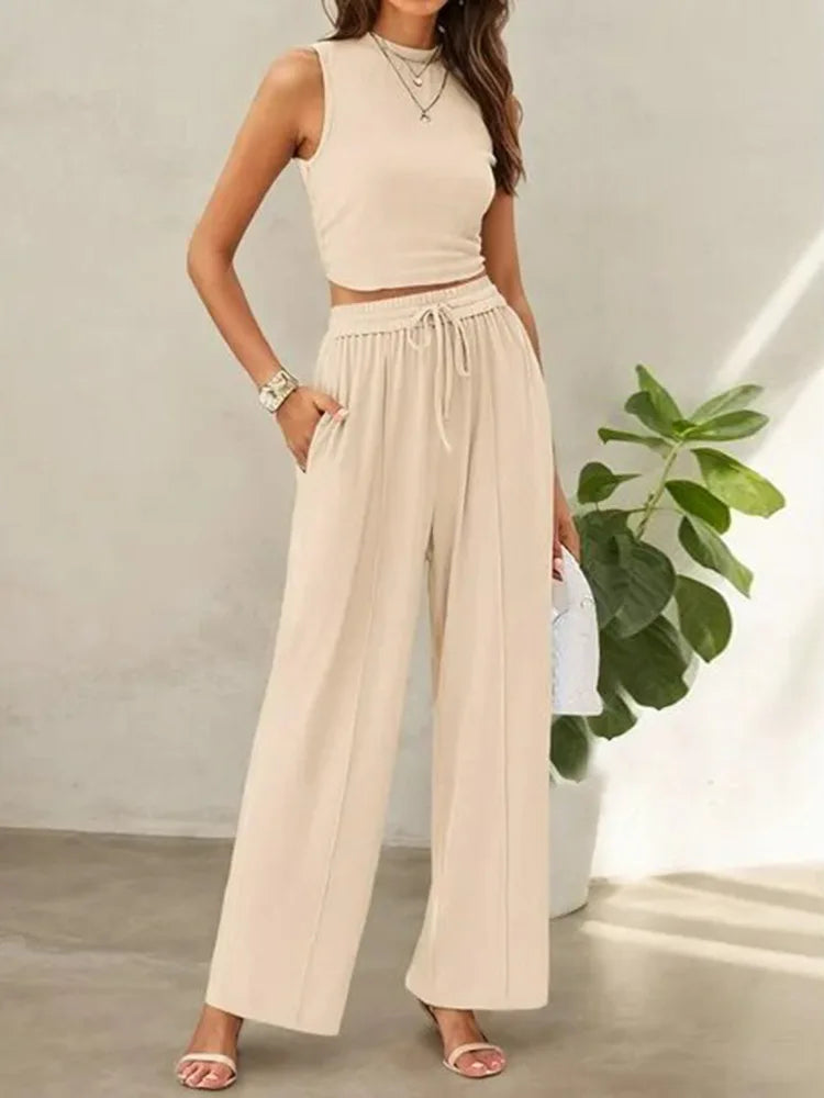 Lena white sleeveless two-piece pants set with relaxed-fit trousers, lightweight summer coord