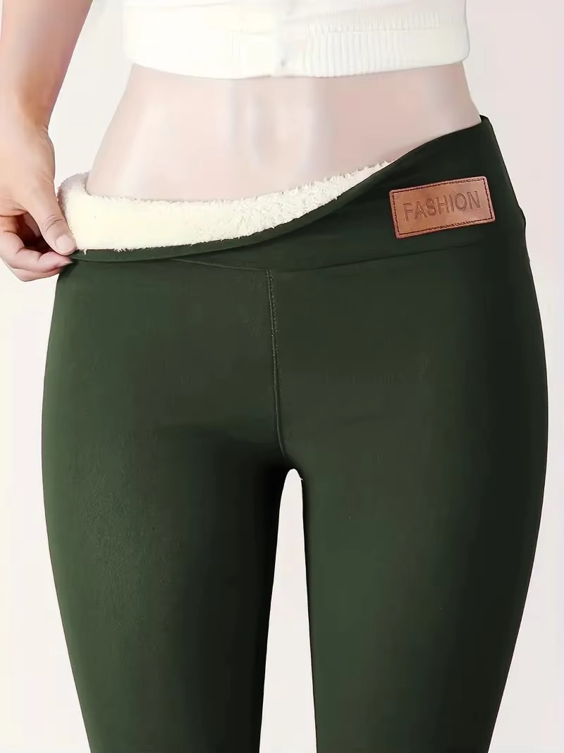 Women's black thermal plush high-waist leggings with fleece lining for cold weather