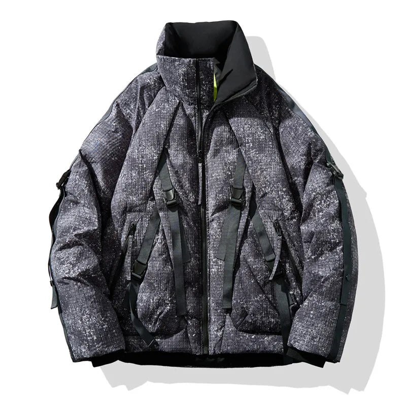 Bulky loose-cut camo puffer jacket with pixel urban print, adjustable straps, high collar, and ribbed edges
