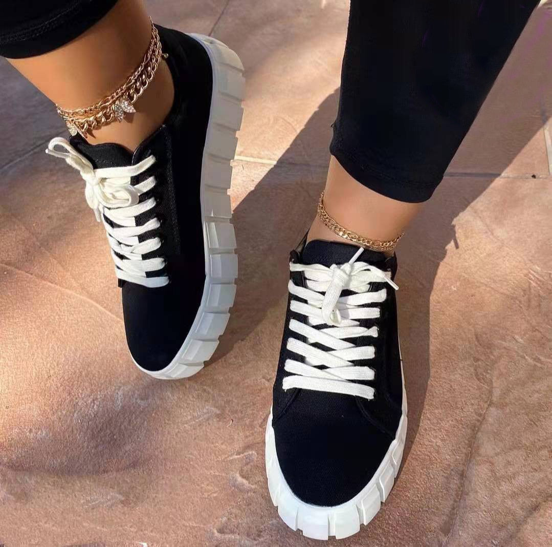 Women's high platform lace-up walking shoes in neutral tone, bold chunky sole, city-ready fashion style