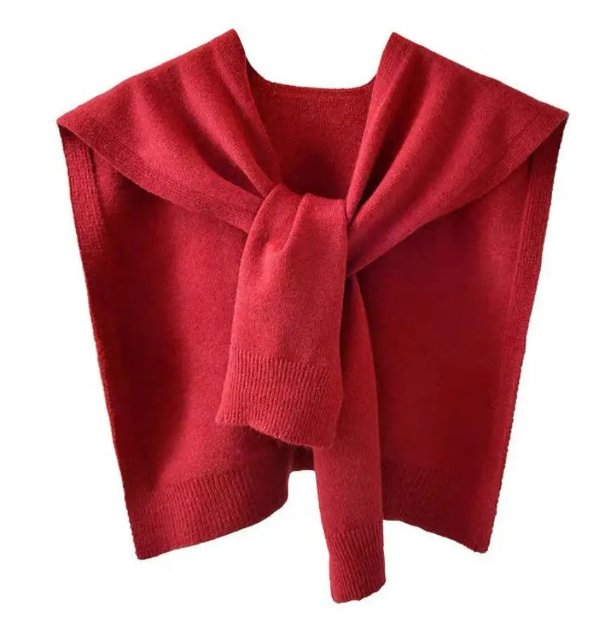 Cream knitted scarf wrap with sweater-inspired texture, rectangular silhouette, versatile drape styling
