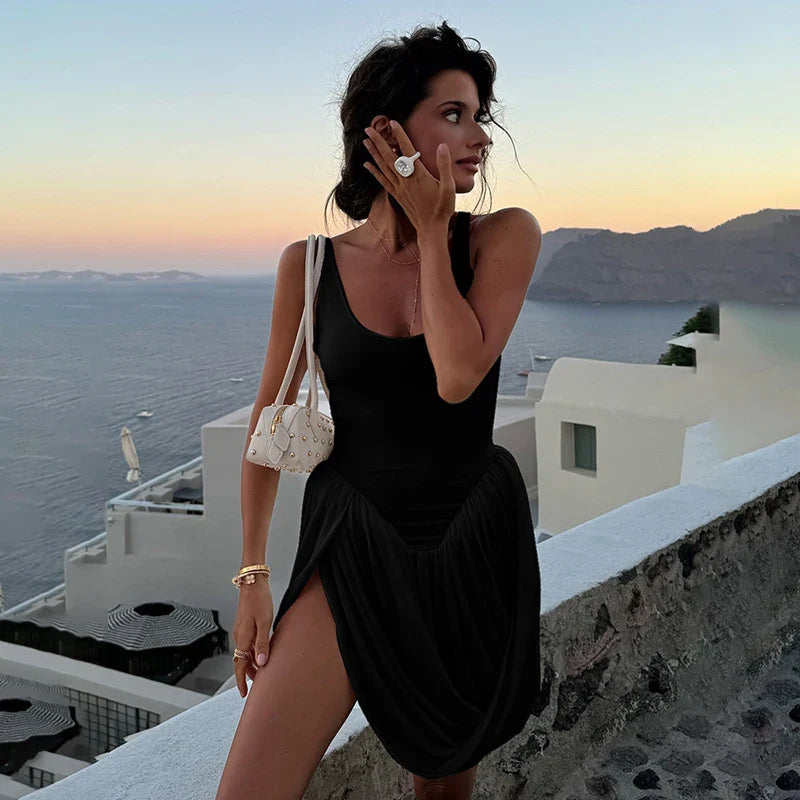 Côte sleeveless scoop neck dress lightweight breathable fabric soft fluid drape relaxed silhouette