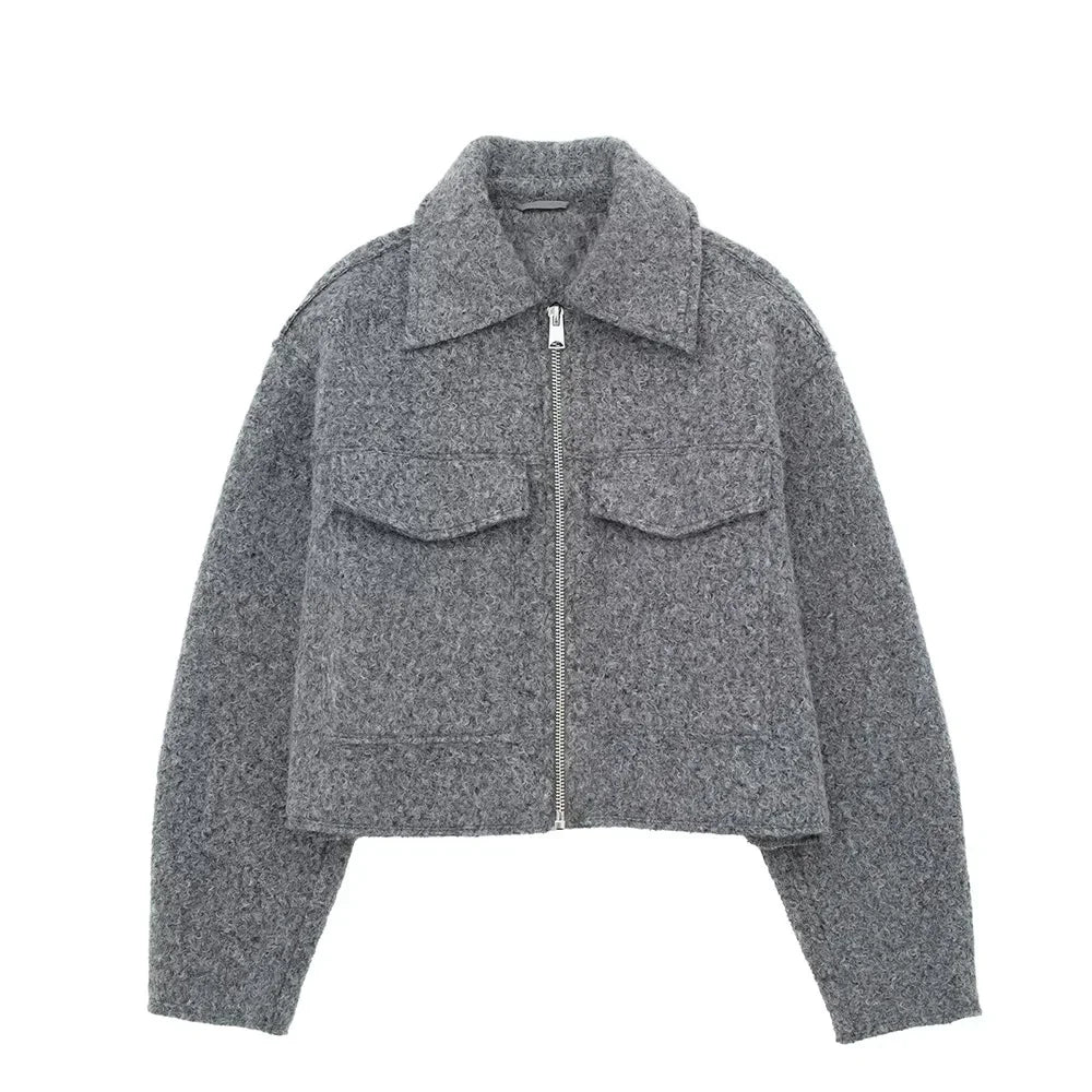 Black urban couture tailored jacket with vintage-inspired lapel collar and front zipper closure