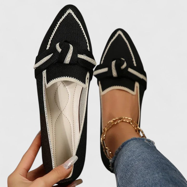 Women's pointed toe slip-on flat loafers in two-tone colorway with elegant knot detail