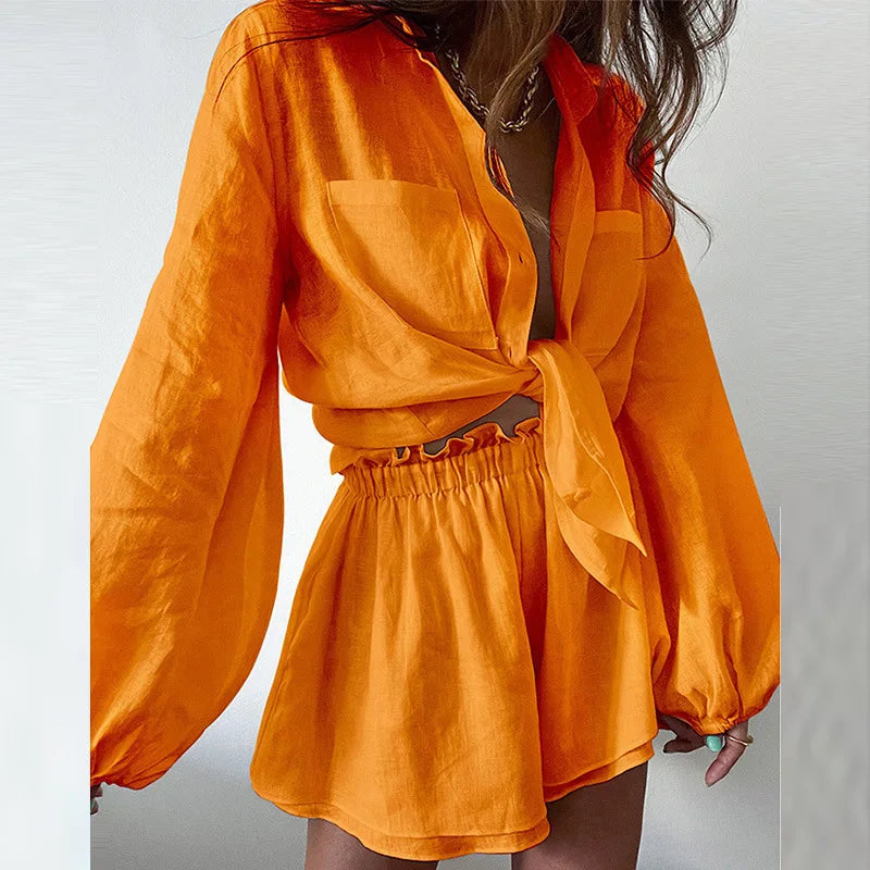 Beige linen summer set with tie-front long-sleeve shirt and high-waisted shorts relaxed fit