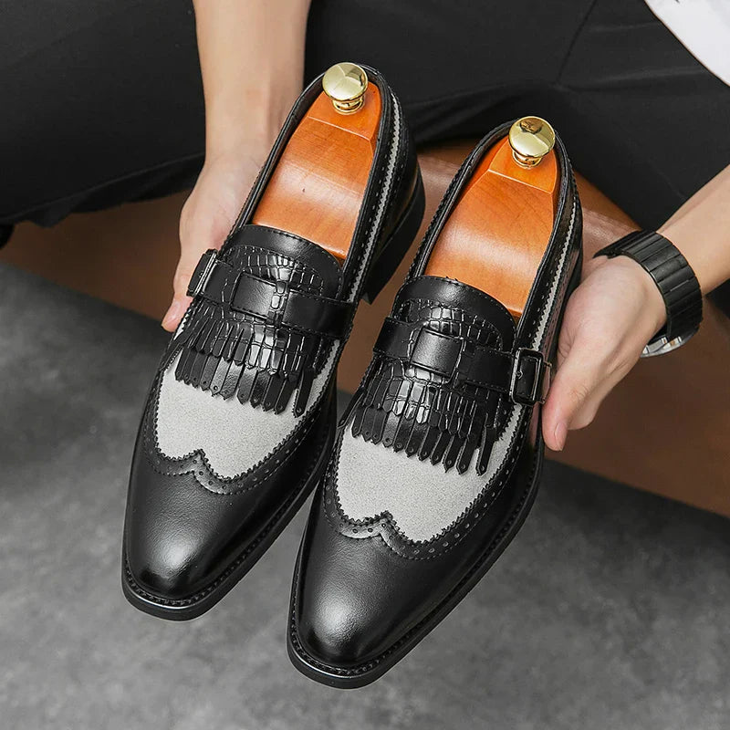 Men's black premium leather slip-on brogue dress shoes with fringe tassel detailing and glossy finish