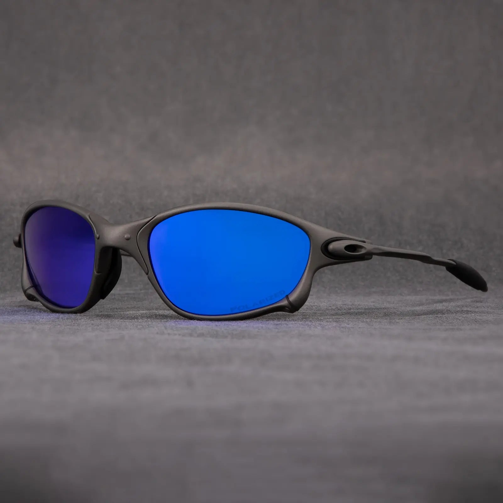 Spectre matte black polarized sunglasses with UV400 protection and rubber arm grips for active outdoor use