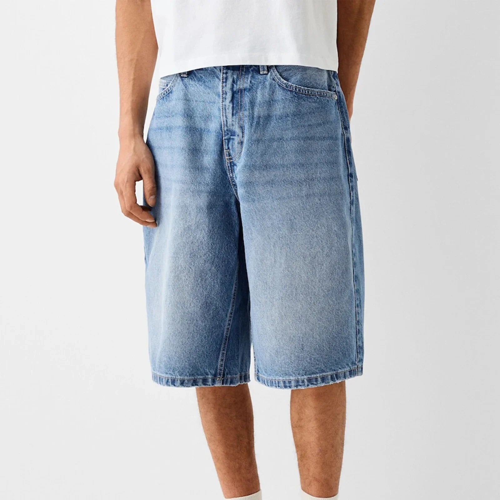 Men's wide-leg washed denim shorts with reinforced stitching and classic five-pocket design