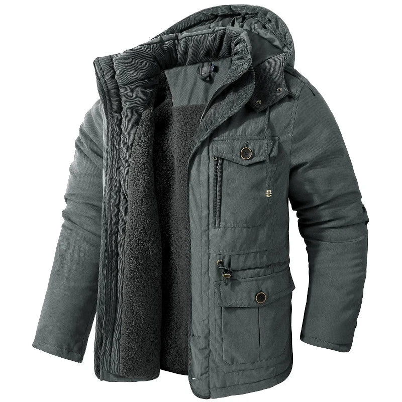 Navy blue winter jacket with storm-ready hood, waterproof breathable tech and thermal-reflective lining