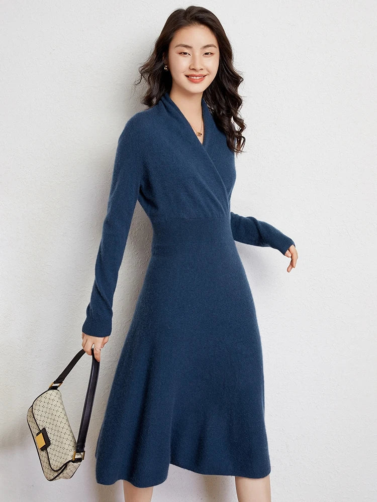 Women's ivory cashmere wrap dress with deep V-neck, figure-forming waist, and elegant drape